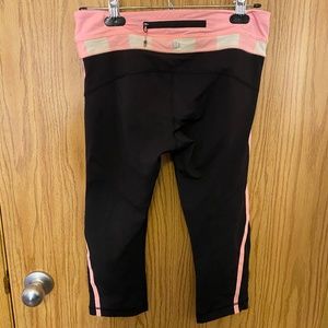Pink and Black Lululemon cropped leggings